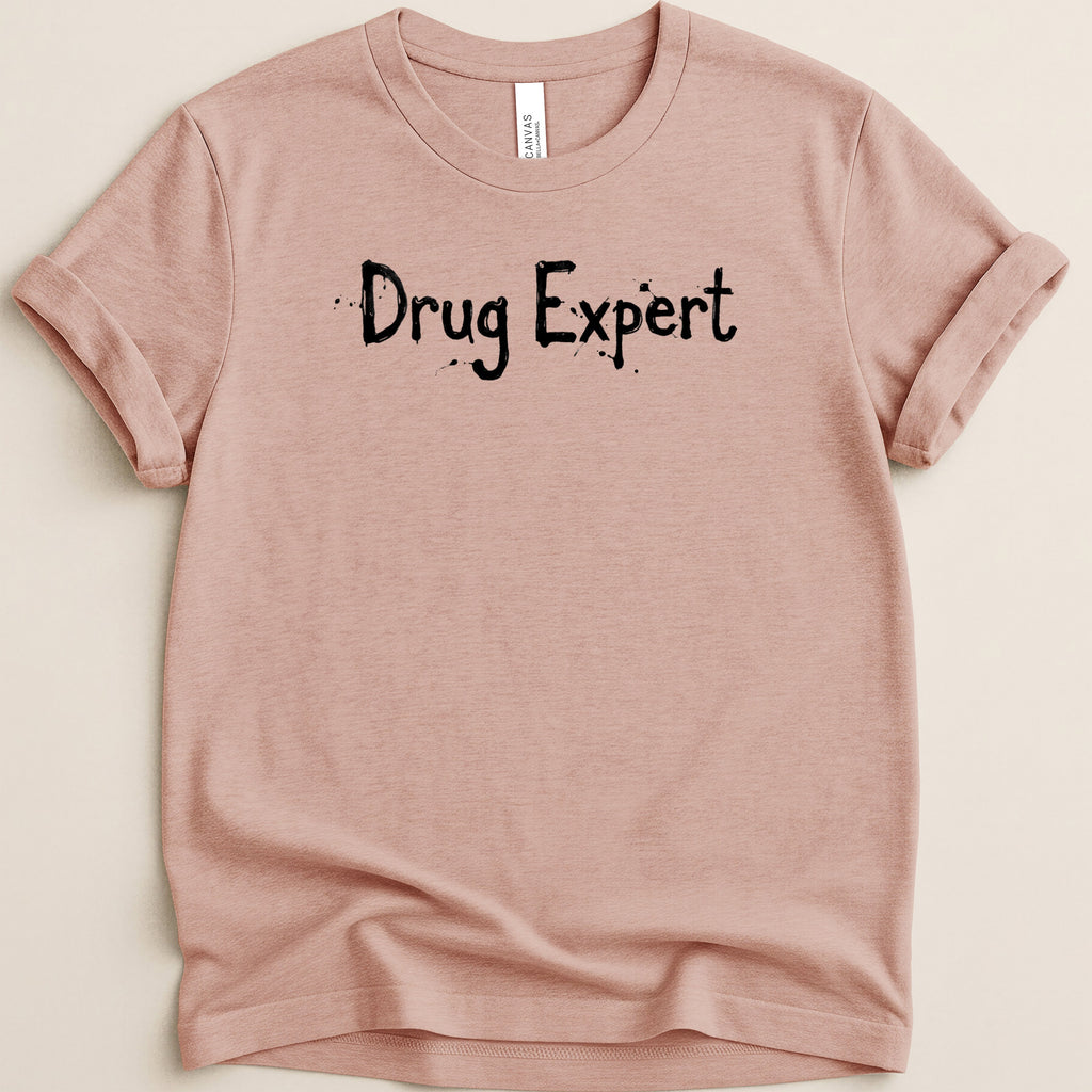 T-shirt with "Drug Expert" text in black, distressed font.