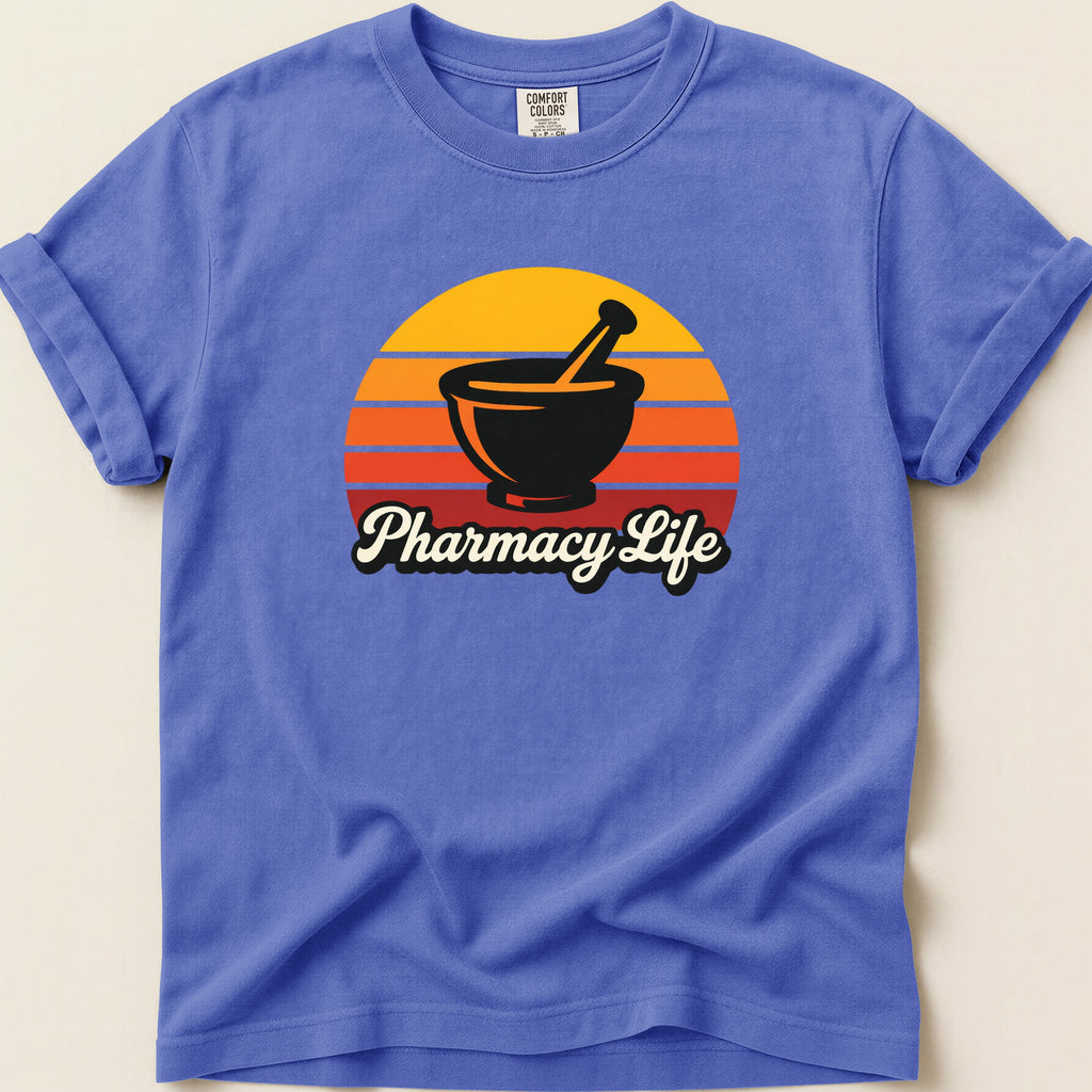 Purple t-shirt with a mortar and pestle and "Pharmacy Life" text within a sunset.