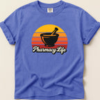 Purple t-shirt with a mortar and pestle and "Pharmacy Life" text within a sunset.