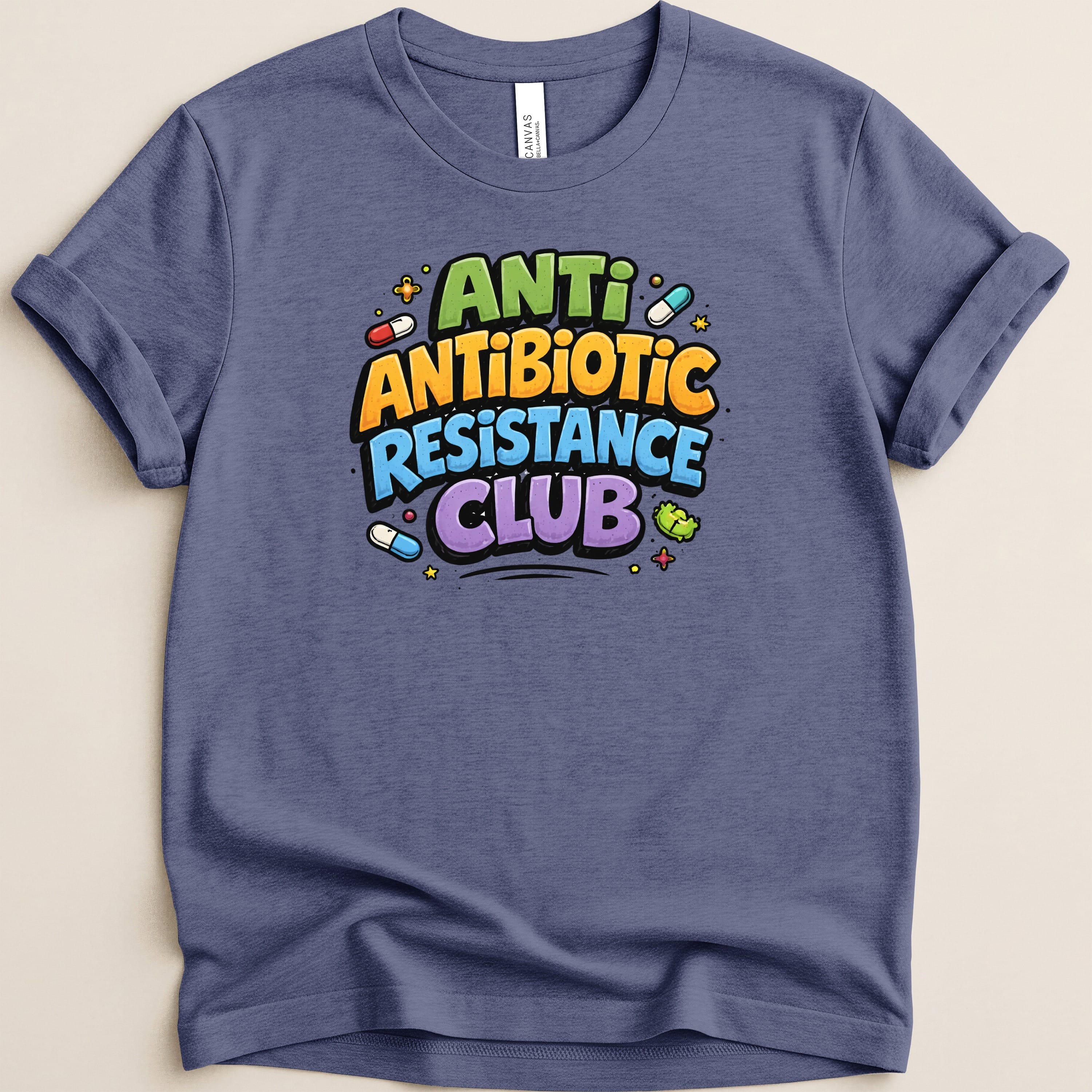 T-shirt with "Antibiotic Resistance Club" text and colorful pill graphics.