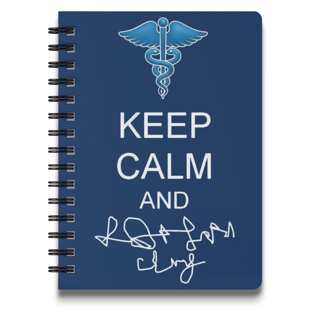 Notebook with Caduceus, "Keep Calm," and signature on blue cover.