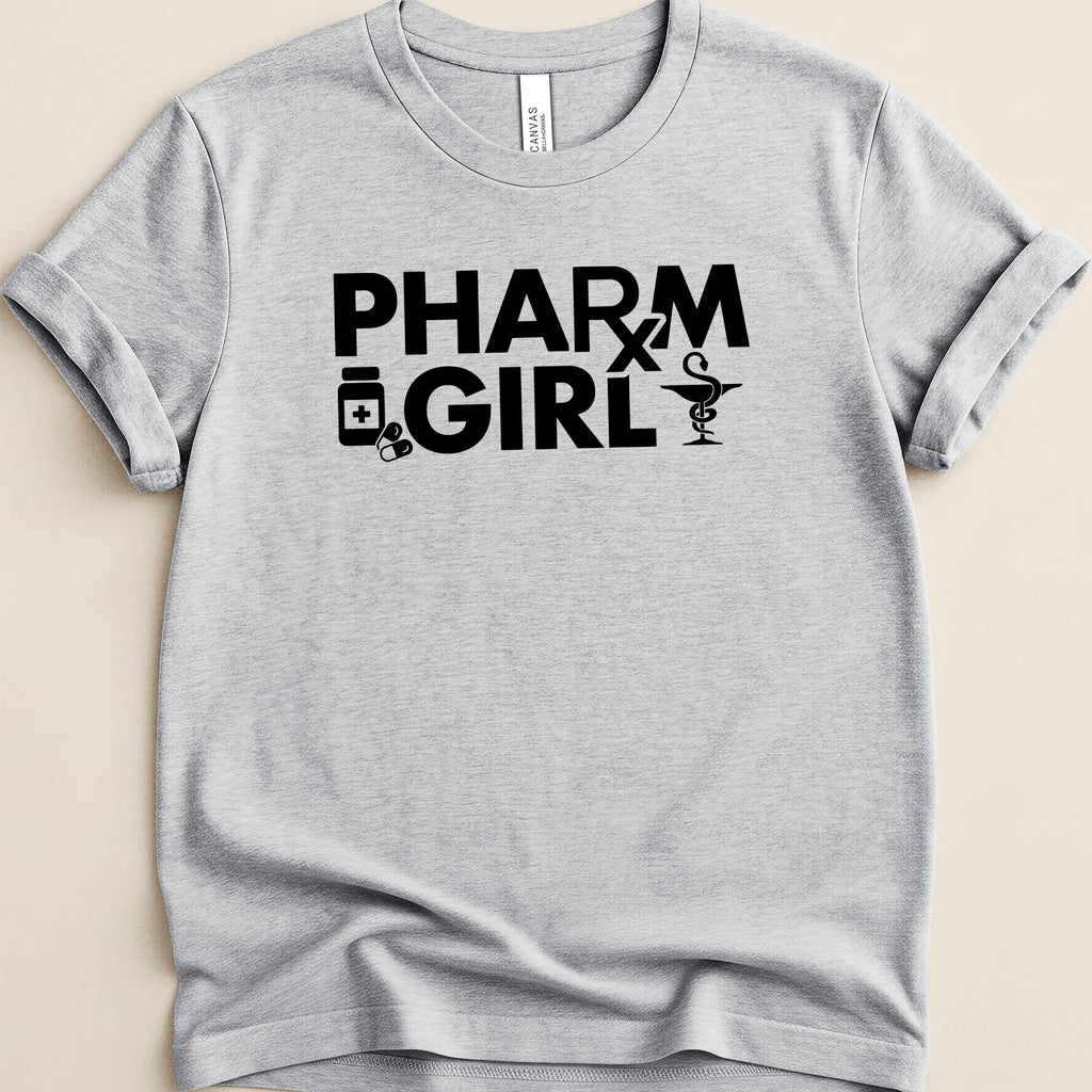Gray t-shirt with black text "PHARM GIRL" and medical icons.