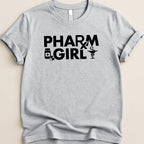 Gray t-shirt with black text "PHARM GIRL" and medical icons.