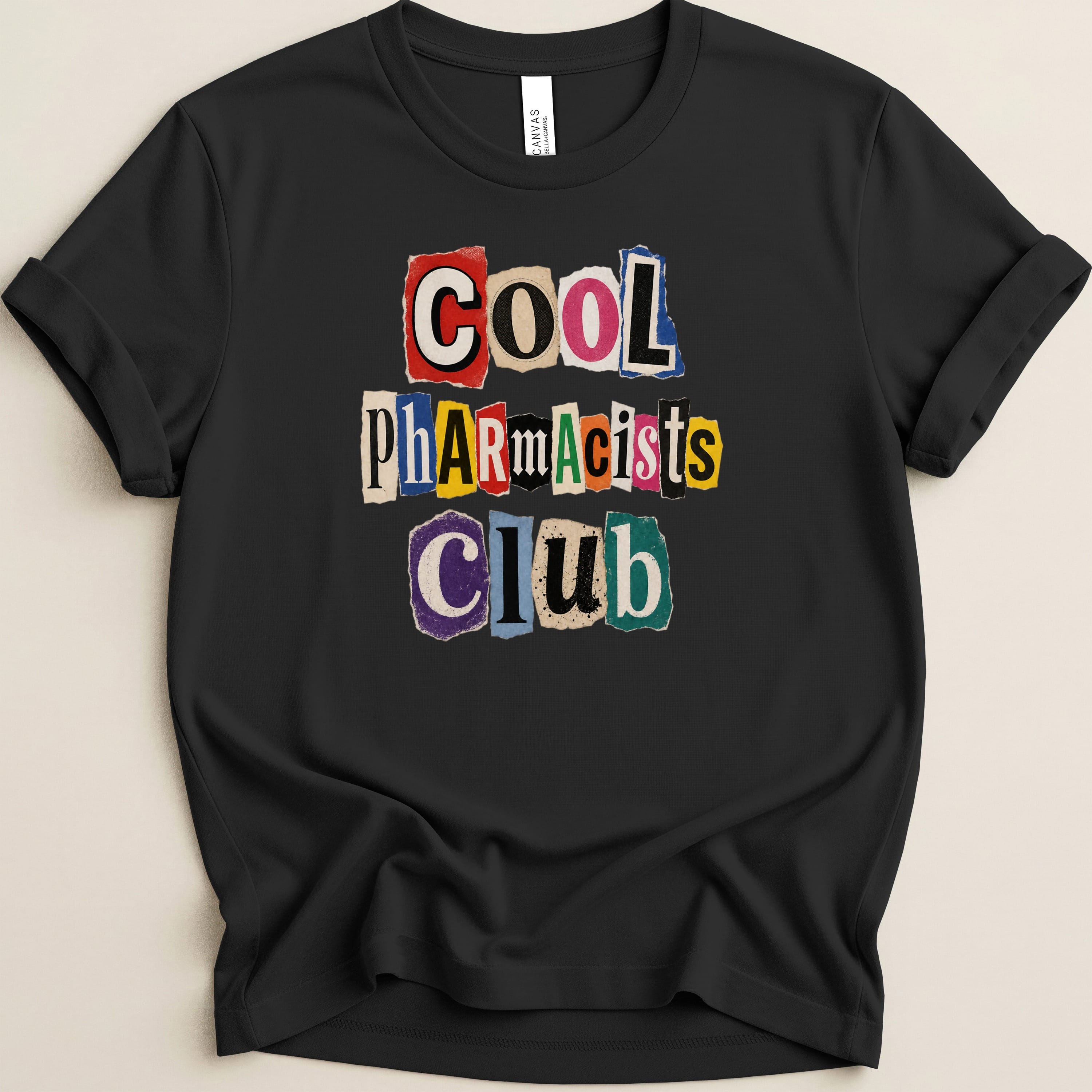 Black t-shirt with "COOL Pharmacists CLUB" in colorful ransom note lettering.