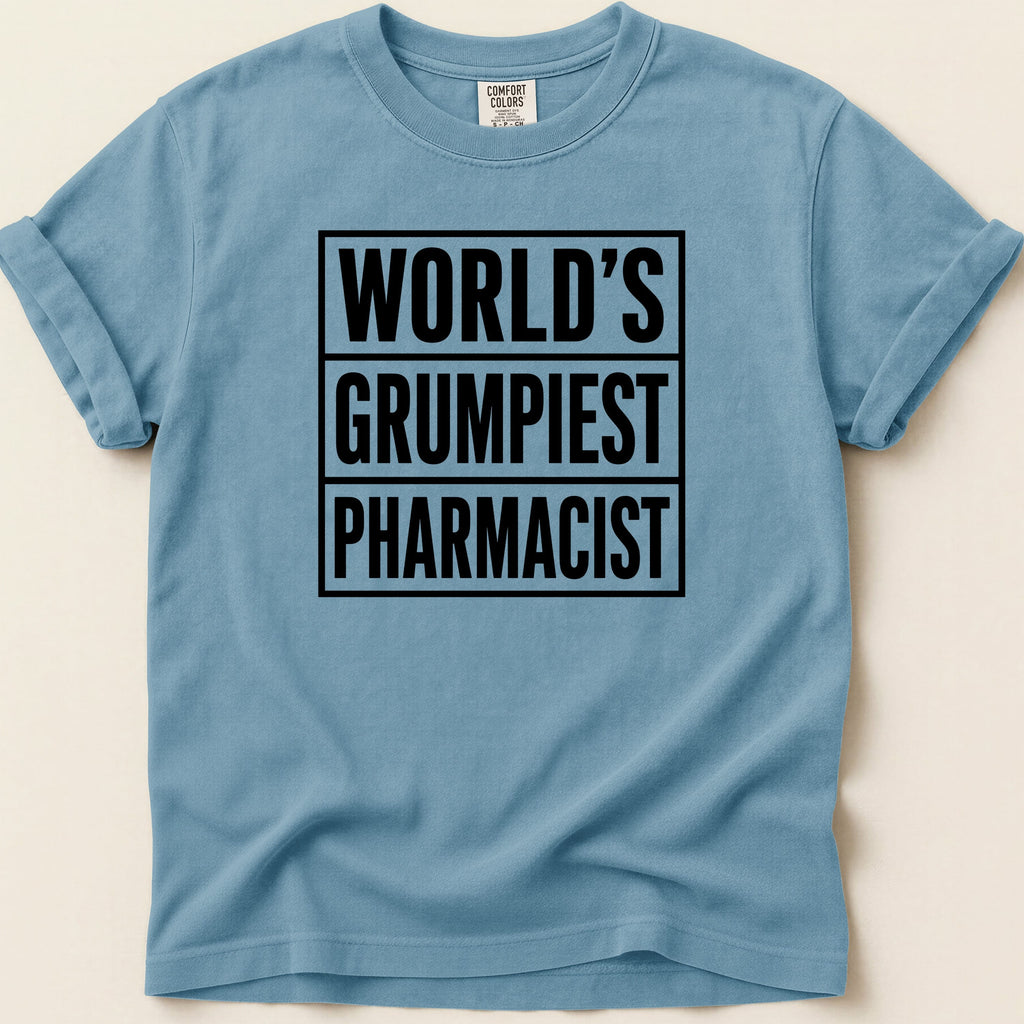 Blue t-shirt with "WORLD'S GRUMPIEST PHARMACIST" in bold black text.