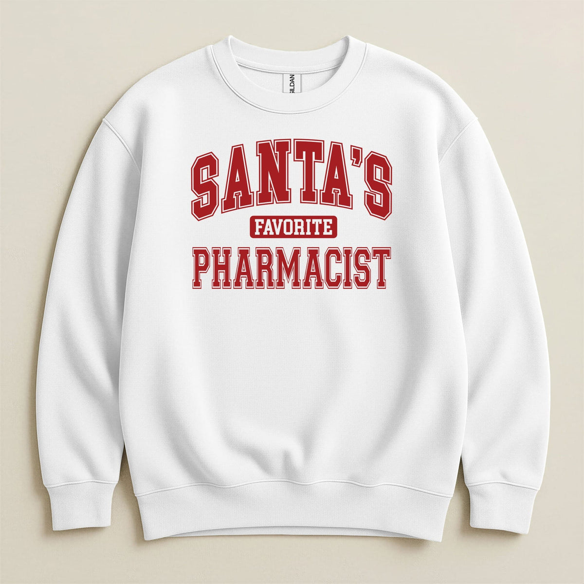 White crewneck sweatshirt with red collegiate lettering on the chest reading Santa's Favorite Pharmacist.
