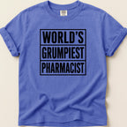 Purple t-shirt with "WORLD'S GRUMPIEST PHARMACIST" in black text.