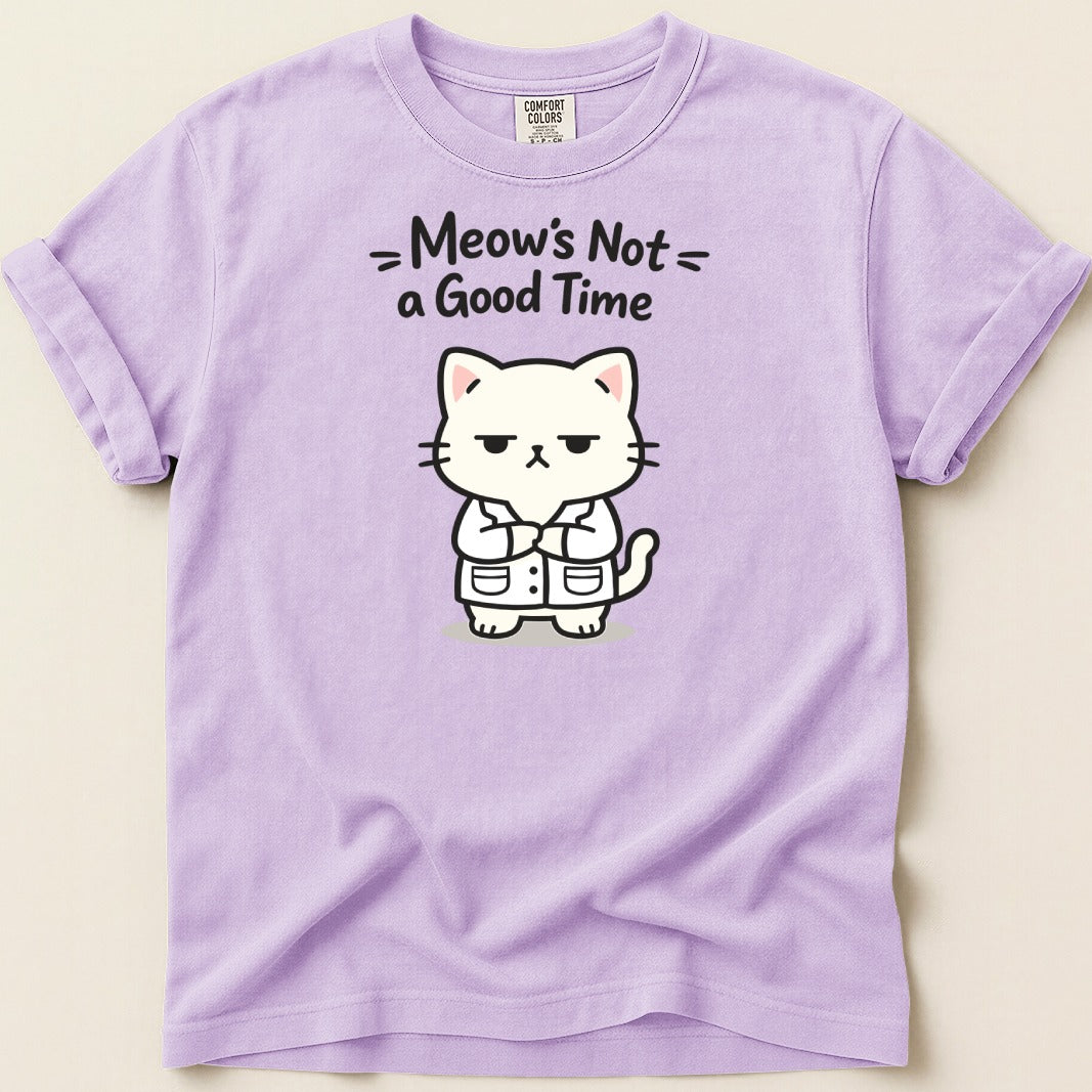 Purple t-shirt with a grumpy cartoon cat wearing a lab coat and the text "Meow's Not a Good Time."