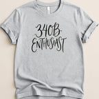 Gray t-shirt with black text that reads "34B ENTHUSIAST".