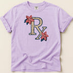 Lavender t-shirt with distressed RX symbol surrounded by flowers and leaves.