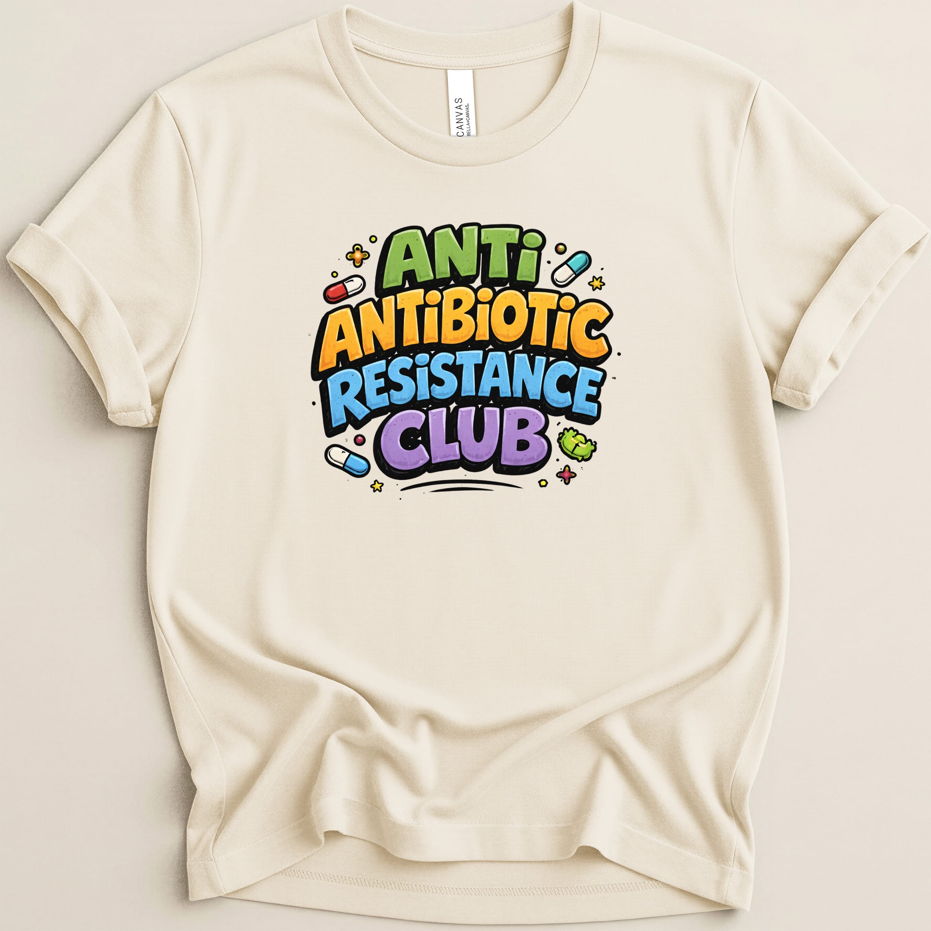 Cream t-shirt with "Anti-Antibiotic Resistance Club" text and pill graphics.