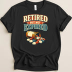 Black t-shirt with "Retired But Not Expired" and spilling pills.