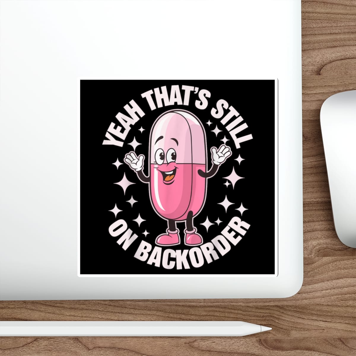 Pink capsule character with arms raised, text "Yeah that's still on backorder".