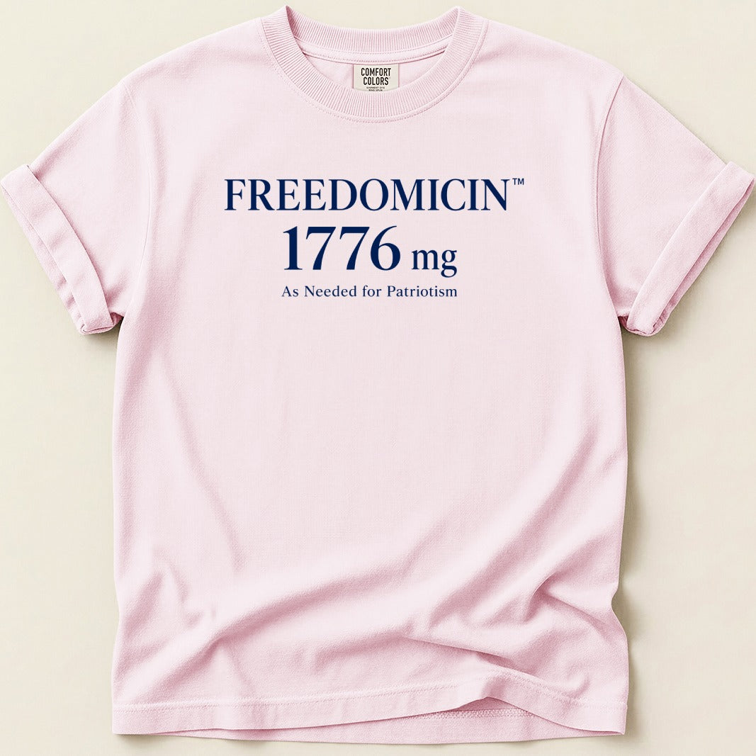 Pink t-shirt with "FREEDOMCIN 1776 mg" and "As Needed for Patriotism" text.
