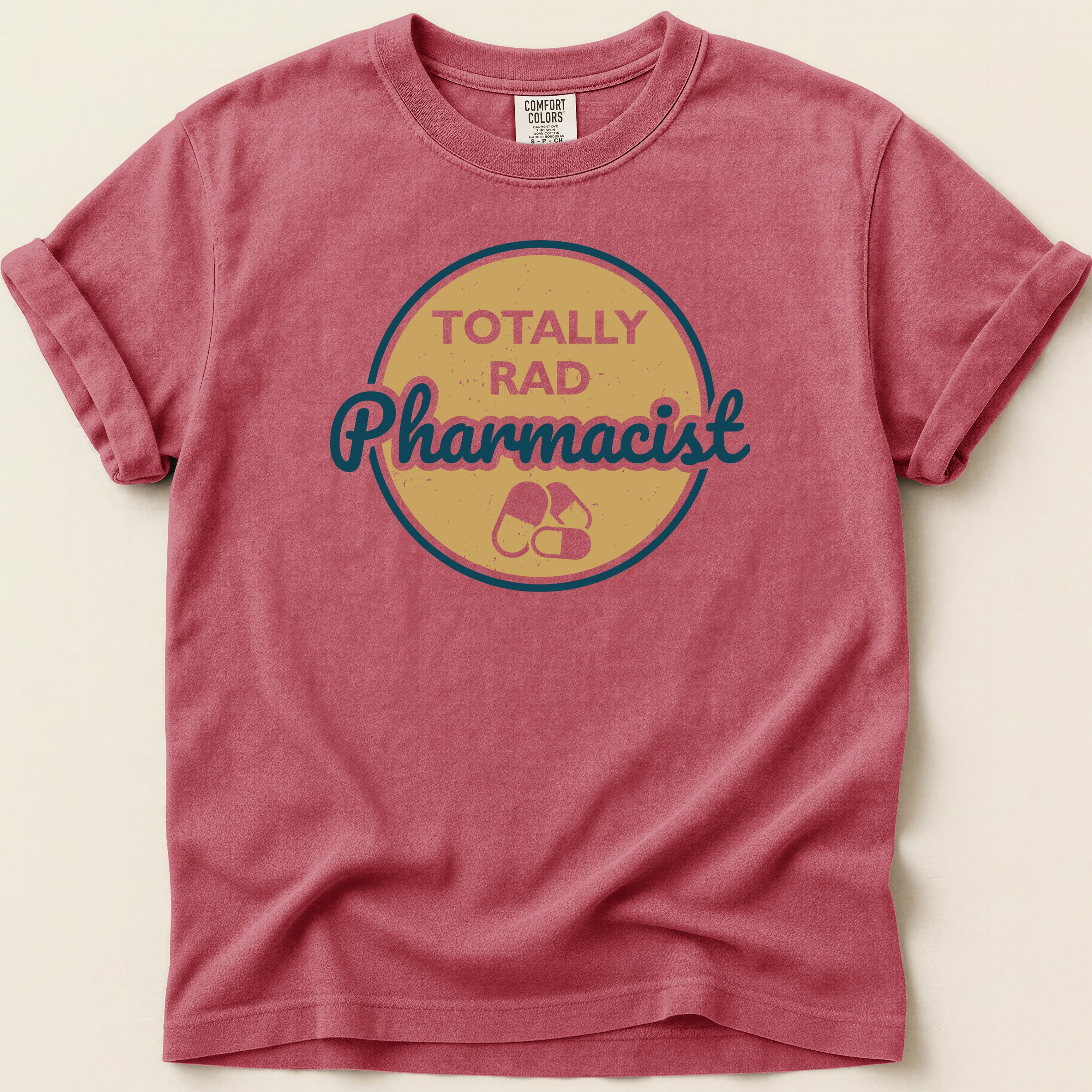 Red t-shirt with "TOTALLY RAD Pharmacist" in a circular graphic.