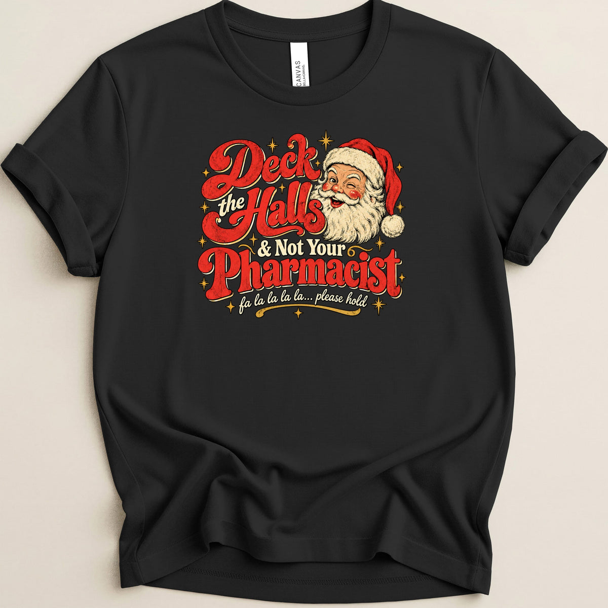 Black crewneck t-shirt featuring a vintage Santa illustration and text that reads Deck the Halls & Not Your Pharmacist.
