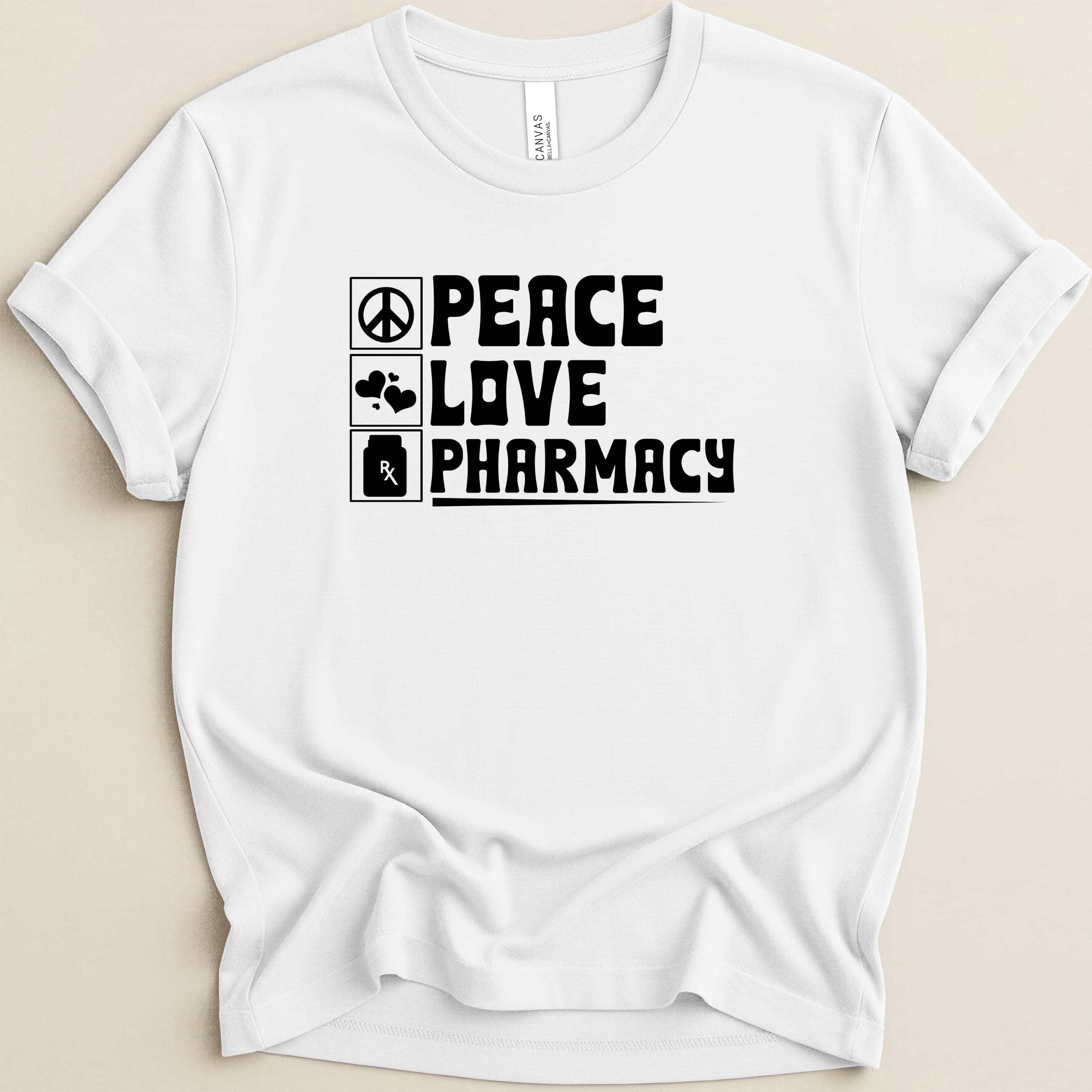 White t-shirt with black text: Peace, Love, Pharmacy, with icons.