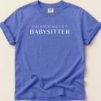 Purple t-shirt with "PHARMACIST BABYSITTER" text.