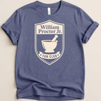 Navy t-shirt with cream William Procter Jr. Fan Club crest featuring a mortar and pestle.