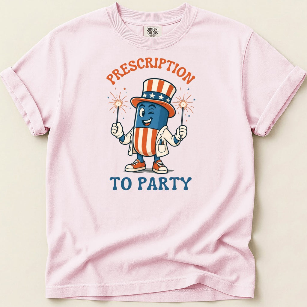 T-shirt with a cartoon pill wearing a patriotic hat and holding sparklers.