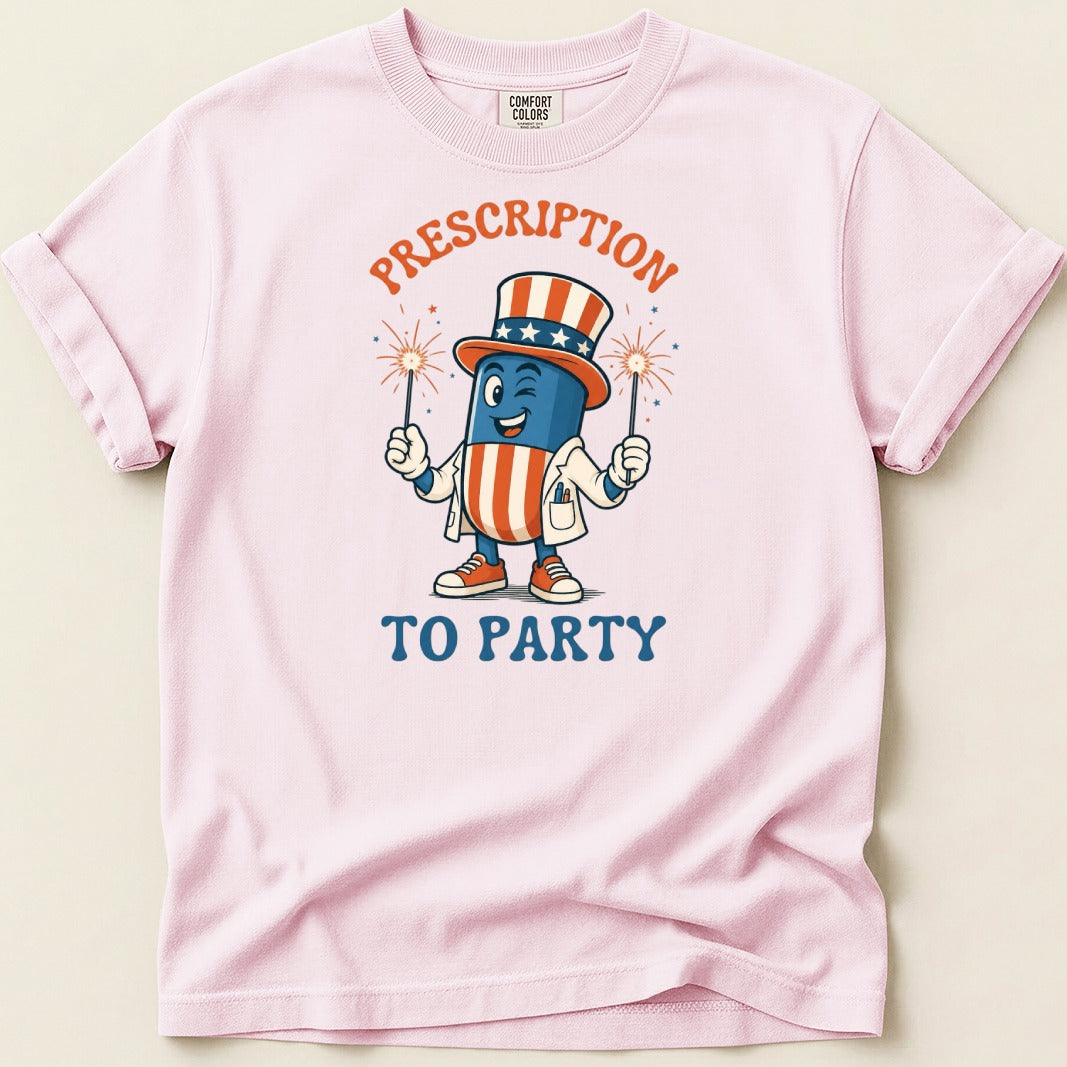 T-shirt with a cartoon pill wearing a patriotic hat and holding sparklers.