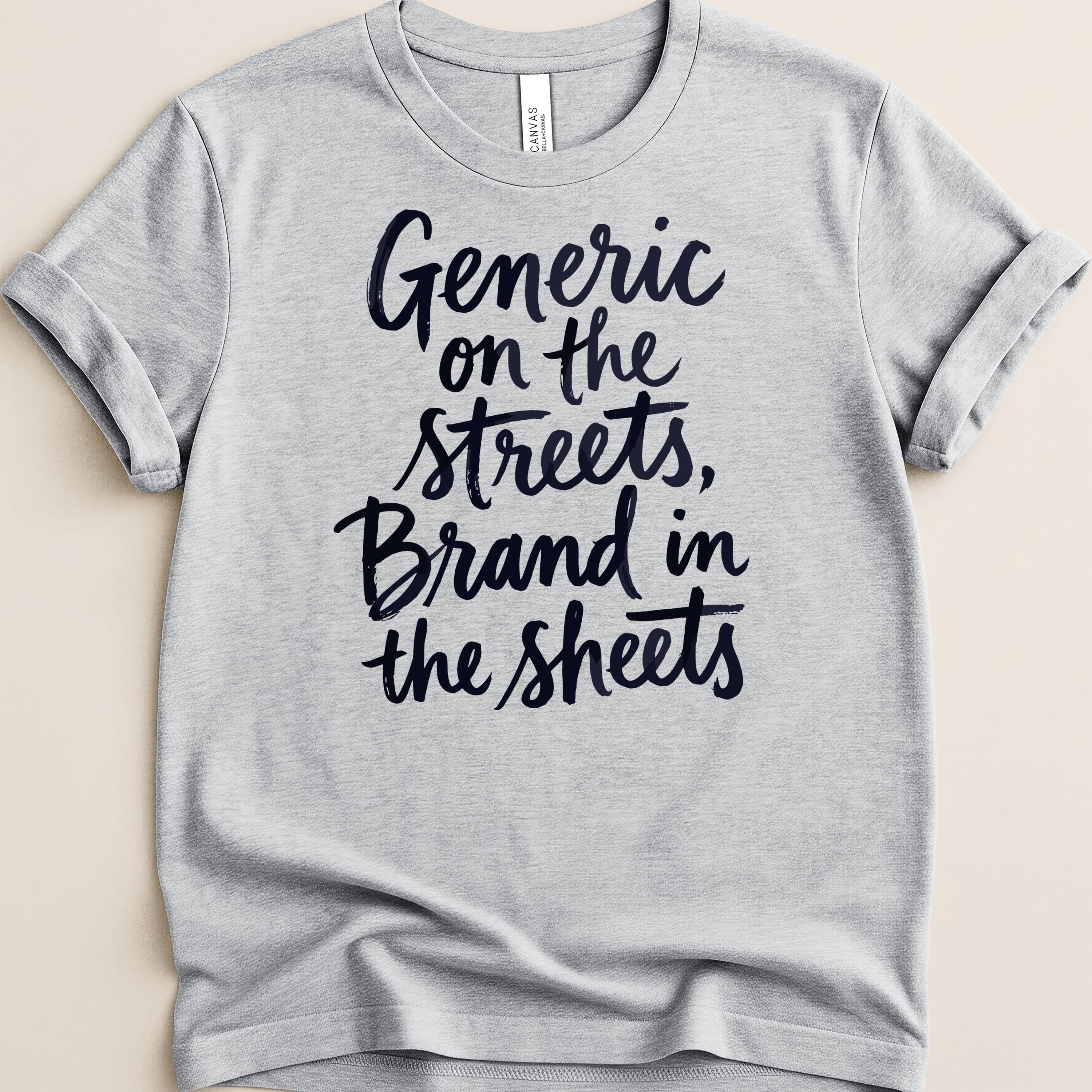 Grey t-shirt with "Generic on the streets, Brand in the sheets" text.