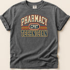 Dark grey t-shirt with "Pharmacy Technician" text in collegiate style.