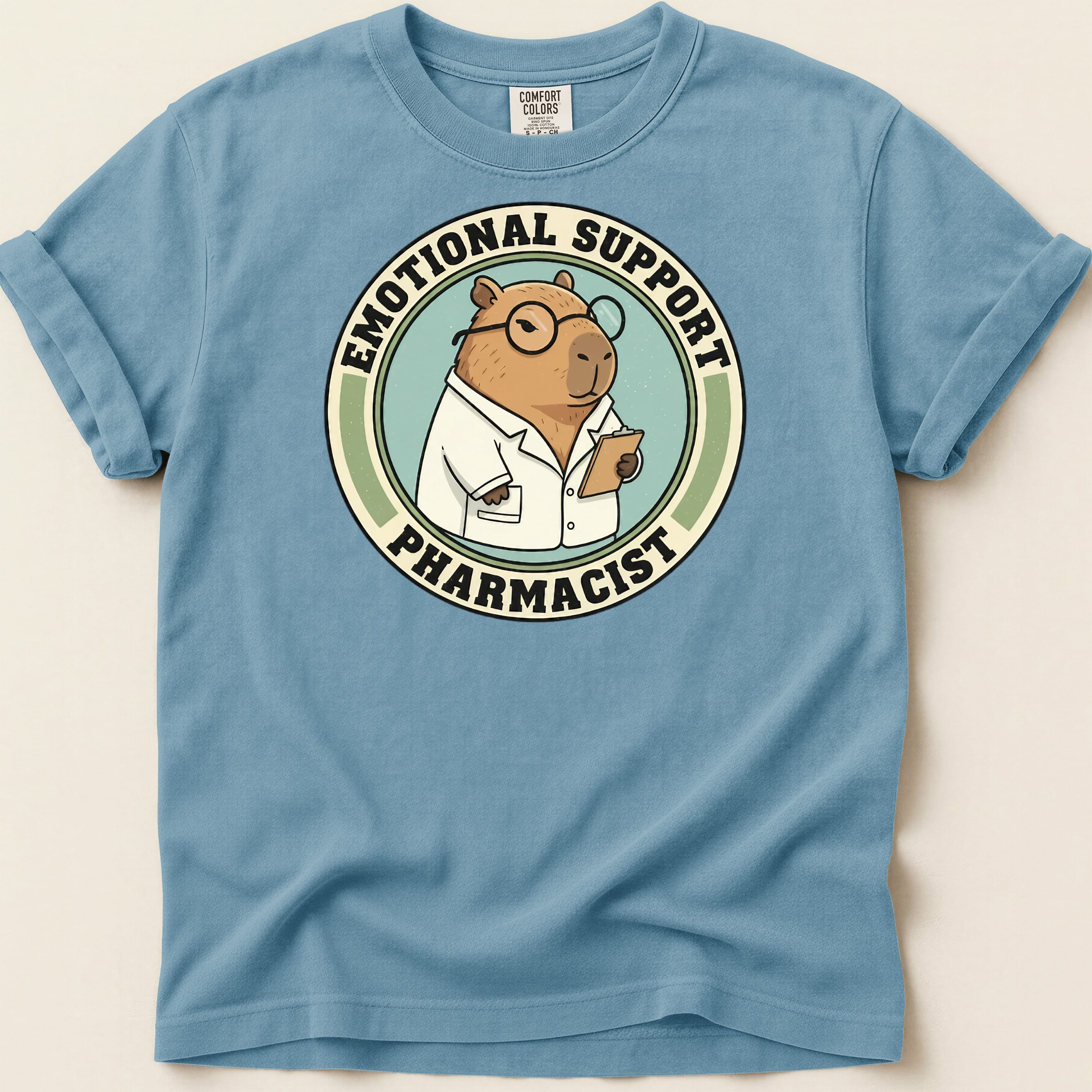 Capybara wearing glasses and lab coat, "Emotional Support Pharmacist" text.