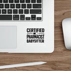 Sticker with "CERTIFIED PHARMACIST BABYSITTER" text on a laptop.
