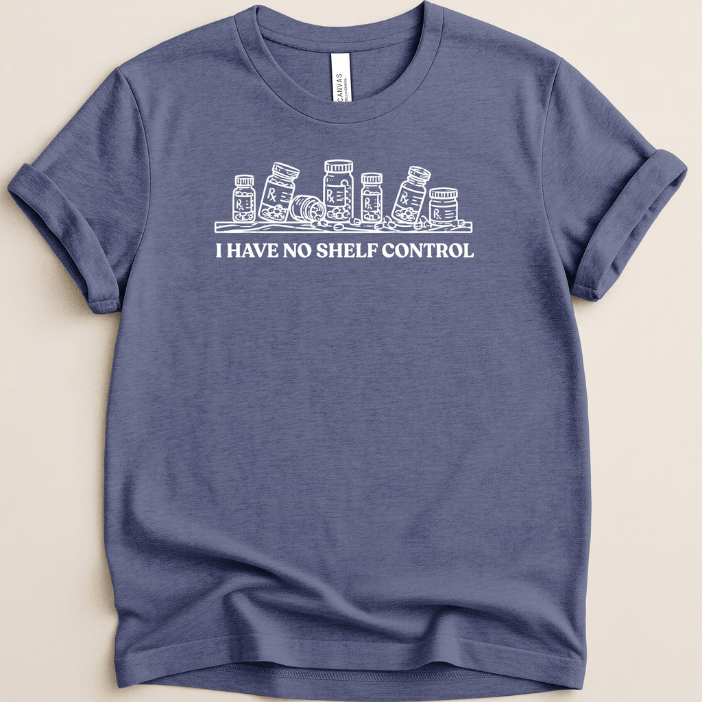 Blue t-shirt with white line drawing of pill bottles and text "I HAVE NO SHELF CONTROL".