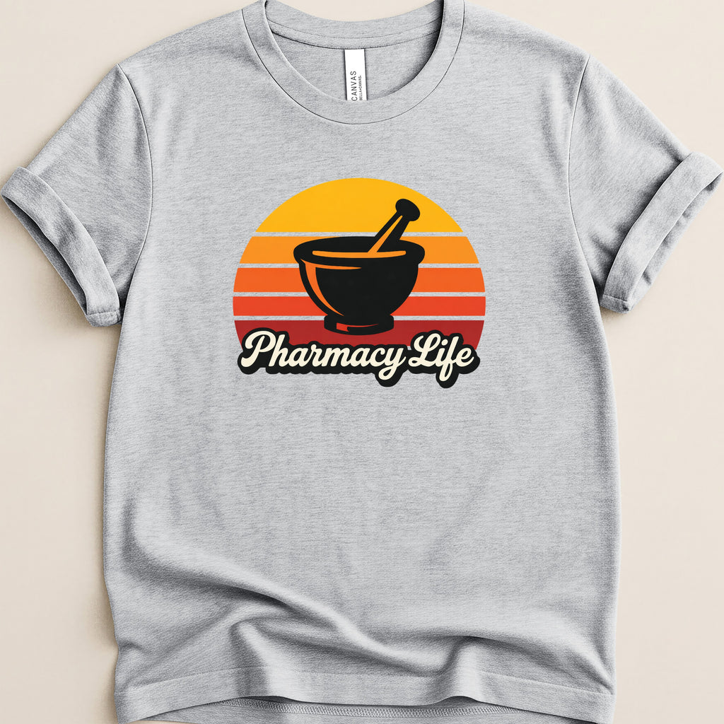Gray t-shirt with "Pharmacy Life" text and a mortar and pestle over a sunset graphic.