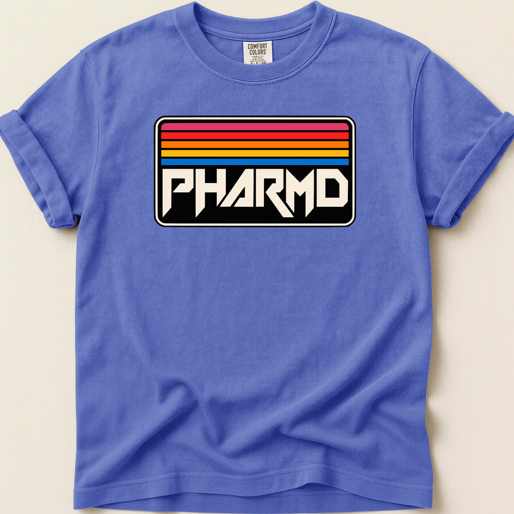 Comfort Colors t-shirt with retro rainbow stripes and PHARMD logo.