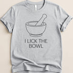 Gray t-shirt with a minimalist mortar and pestle design and text.