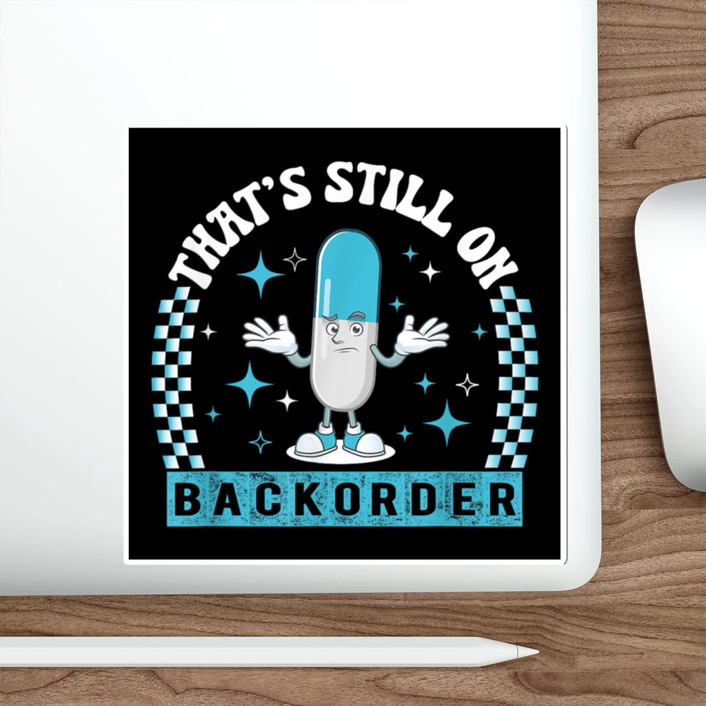 Pill character with text "THAT'S STILL ON BACKORDER" on a checkered background.