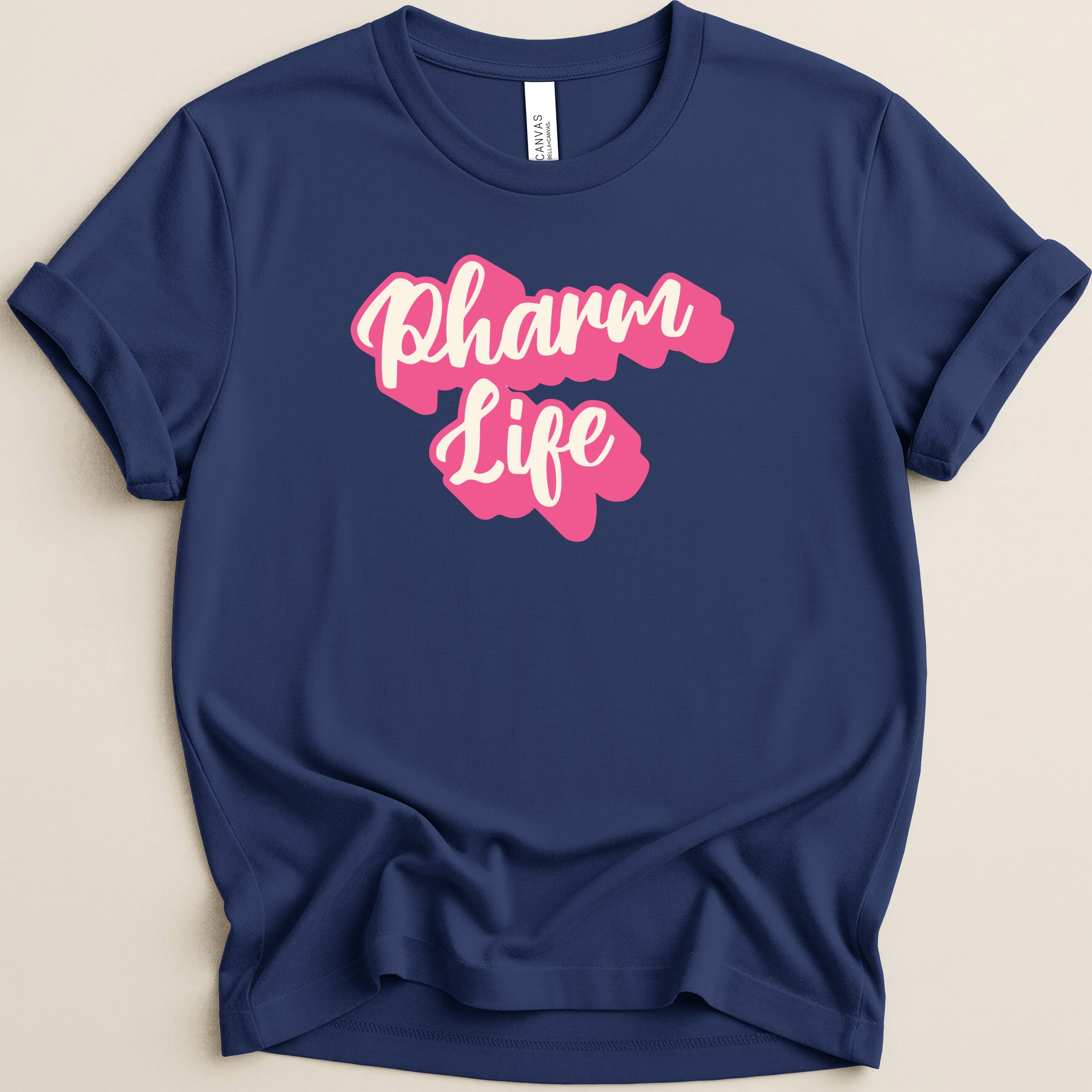 Navy blue t-shirt with "Pharm Life" in pink and white lettering.