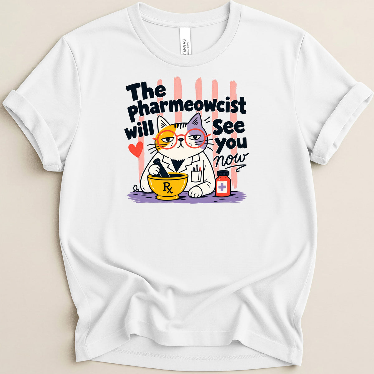 White t-shirt with cartoon cat pharmacist graphic reading "The Pharmeowcist will See you now".