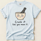 Light blue t-shirt with cartoon mortar and pestle, text reads "Crush it like you mean it."