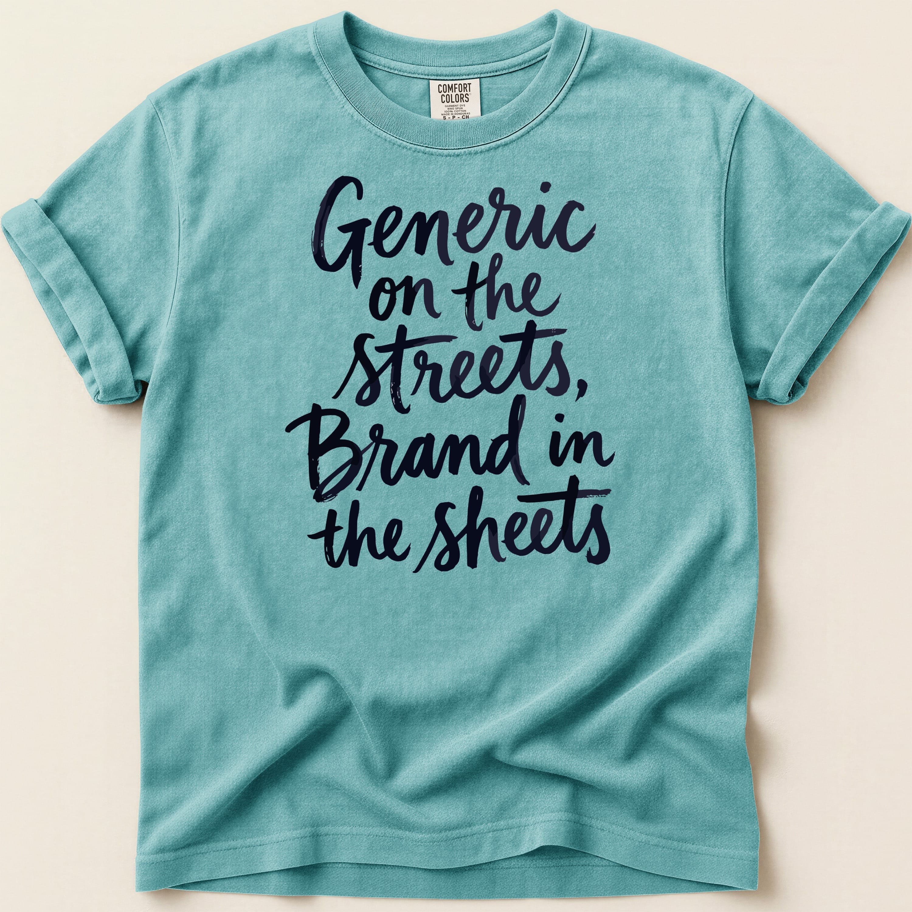 Teal t-shirt with "Generic on the streets, Brand in the sheets" text.