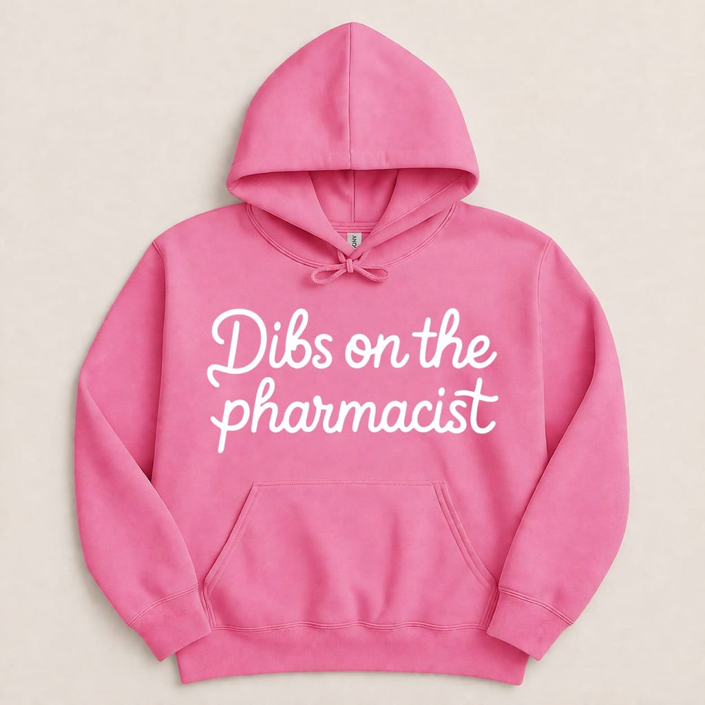 Pink hoodie with white text "Dibs on the pharmacist".