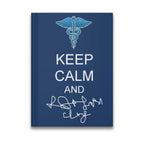 Blue notebook with Caduceus symbol and "KEEP CALM AND" text above a signature.