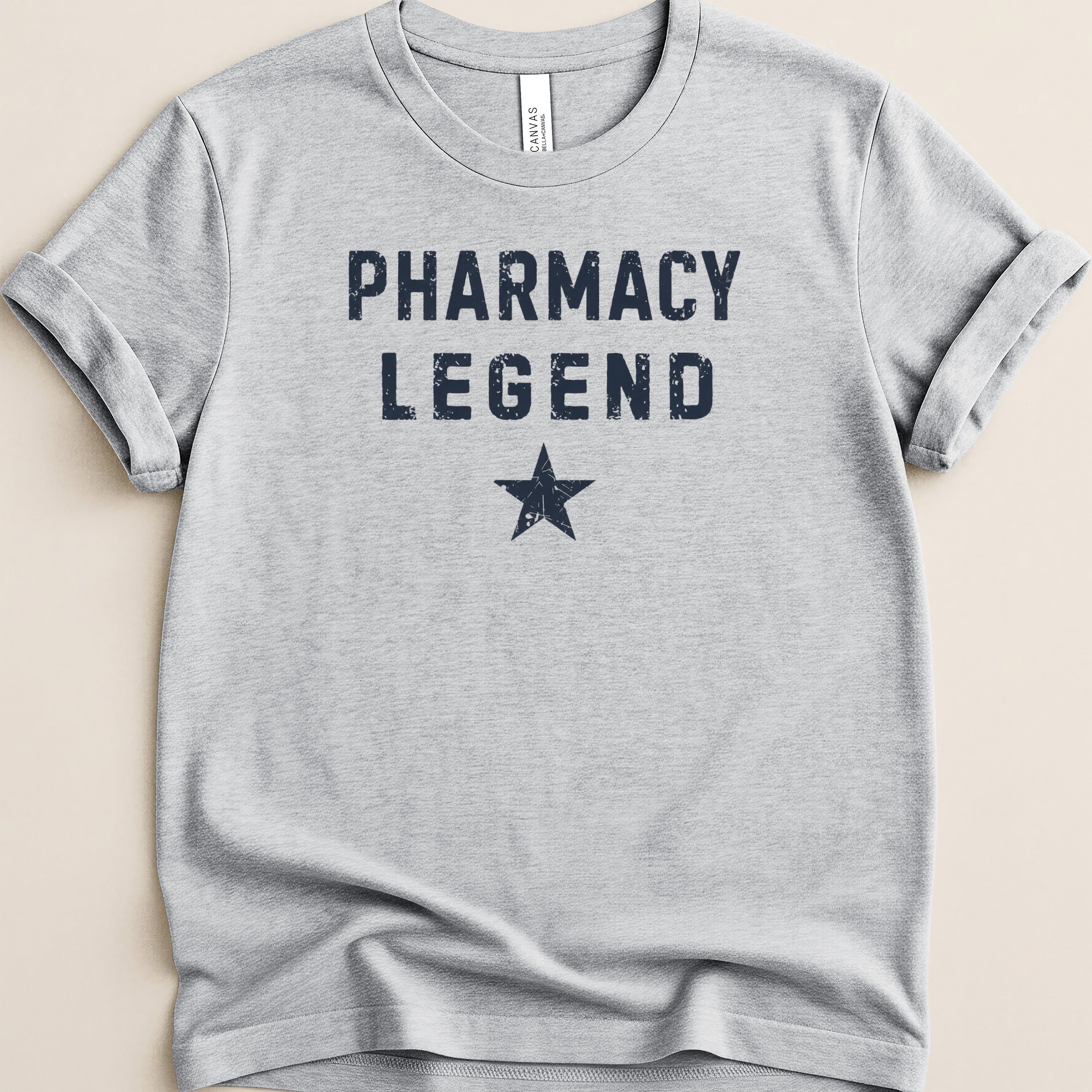 Grey t-shirt with "Pharmacy Legend" and a star.