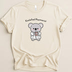 Cartoon koala in pharmacist coat holding a prescription bottle.