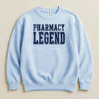 Light blue sweatshirt with "PHARMACY LEGEND" in navy blue lettering.