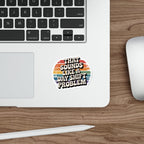Sticker with text "THAT SOUNDS LIKE A DAY SHIFT PROBLEM" on a laptop.