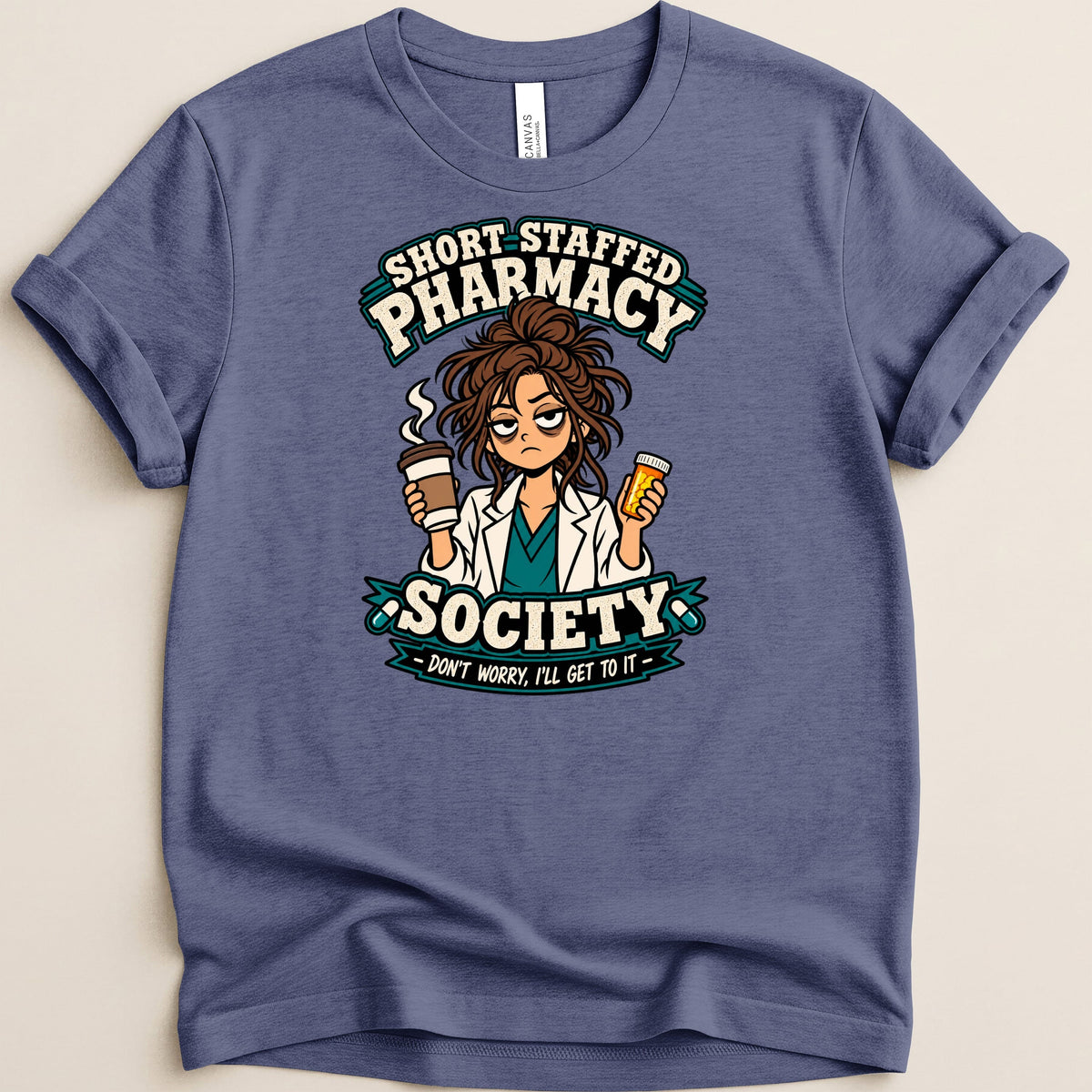 T-shirt graphic with text "Short Staffed Pharmacy Society" and a tired pharmacist.