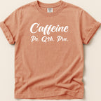 Peach t-shirt with "Caffeine Po. Q4h. Prn." text.