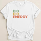 White t-shirt with "BIG PIC ENERGY" in green, yellow, and orange text.