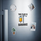 Sticker on a refrigerator reads "This Place is Bananas" with an IV bag.