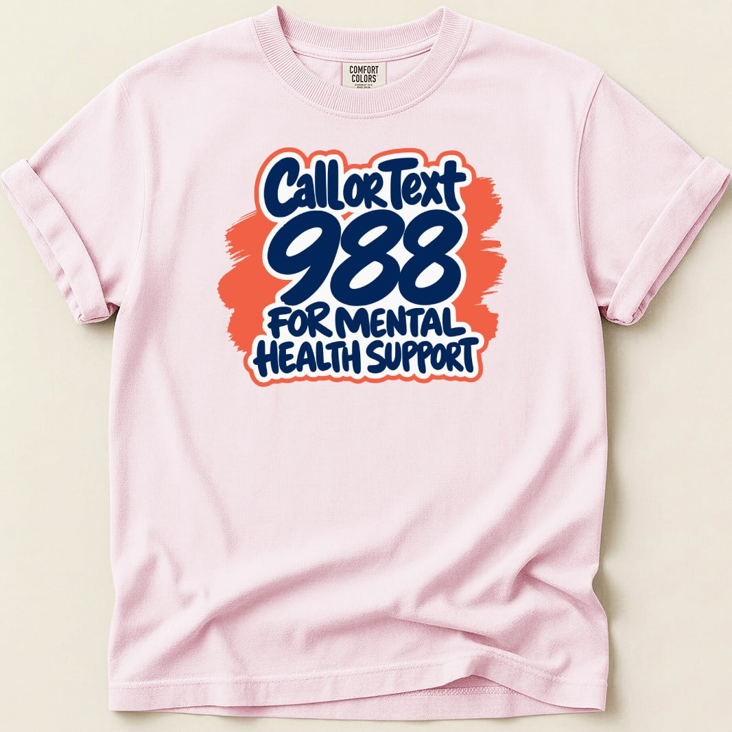 Pink t-shirt with "Call or Text 988 for Mental Health Support" graphic.