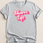 Grey t-shirt with "Pharm Life" text in pink script.